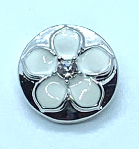 White Enamel Flower set in Sliver with a Crystal